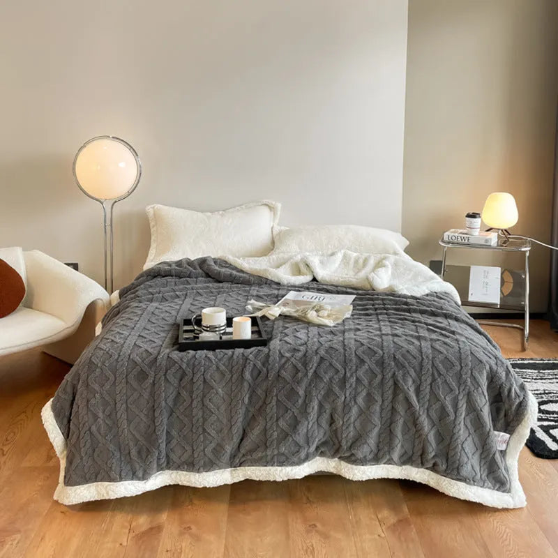 Polyester thermal flannel blanket in tea green colour on bed