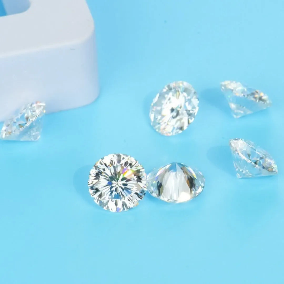 Round loose moissanite gemstone with eight hearts and eight arrows cut on a white background.