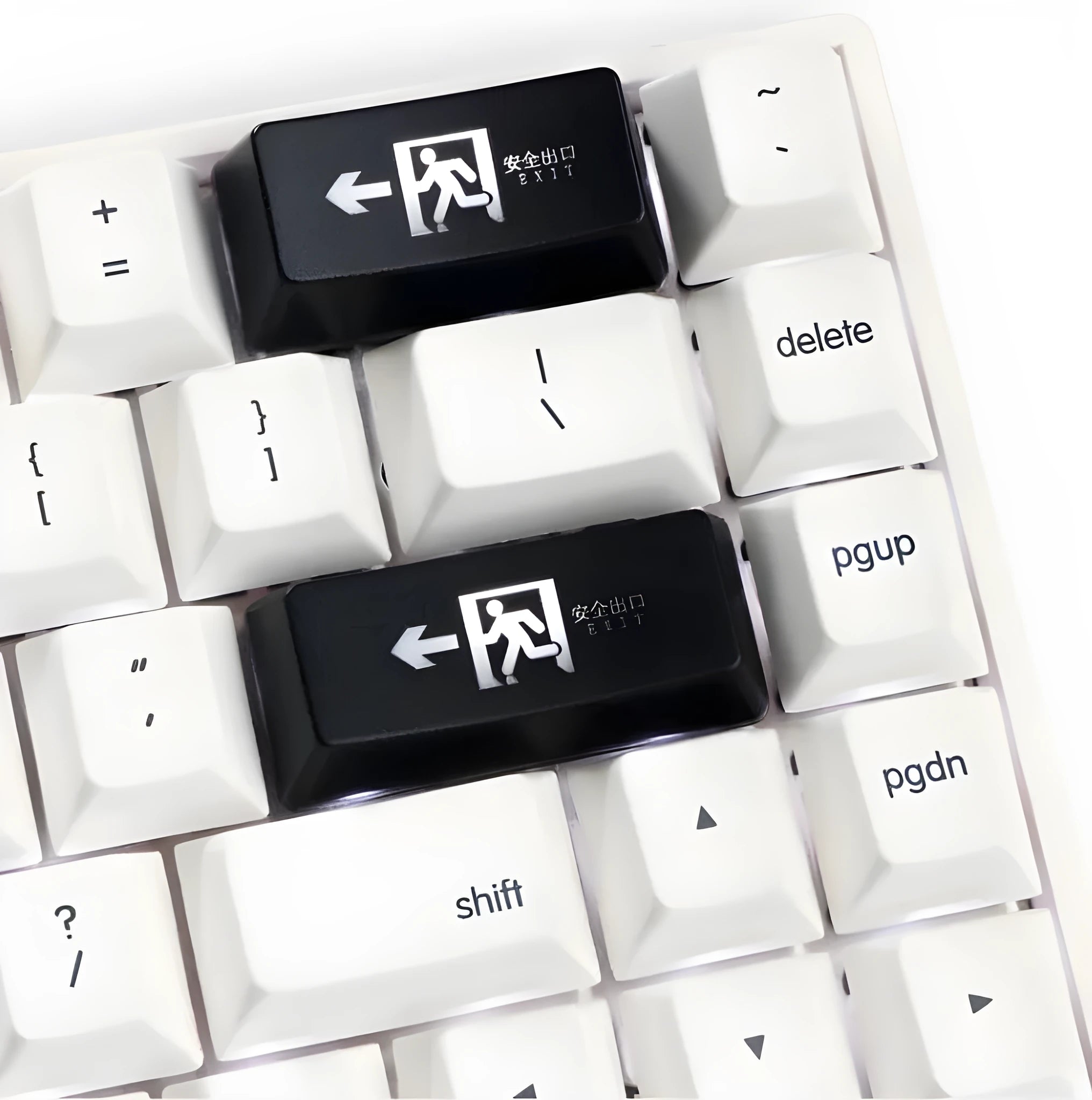 Red Safety Evacuation Exit icon key cap for a mechanical keyboard backspace key.