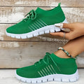 Women's casual breathable flying knit flat shoes in various colours on a white background.