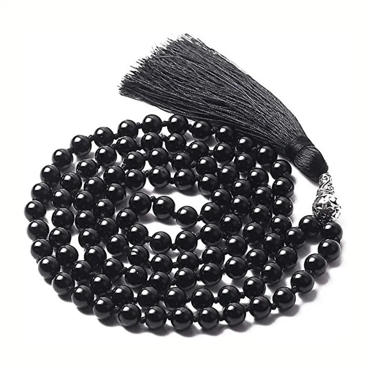 Agate tassel necklace with geometric pattern featuring multiple colourful stones including amethyst and lapis lazuli