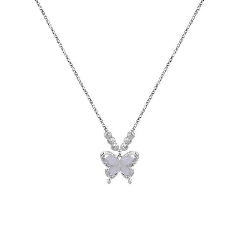 Women's silver butterfly necklace with 925 silver pendant and adjustable cross chain showing opal detail