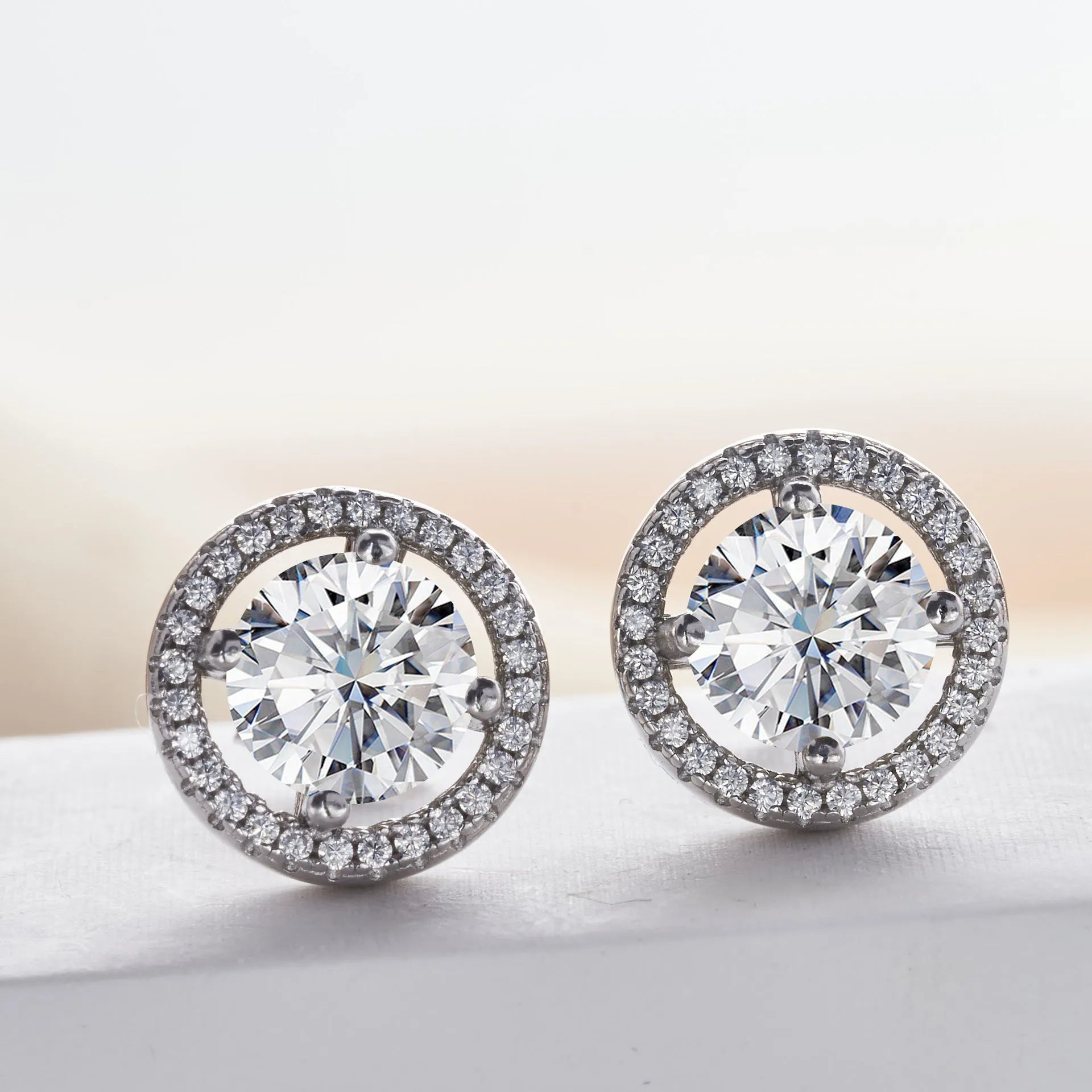 Micro inlaid moissanite stud earrings in S925 sterling silver with round natural stones, unisex design, 1CT per pair