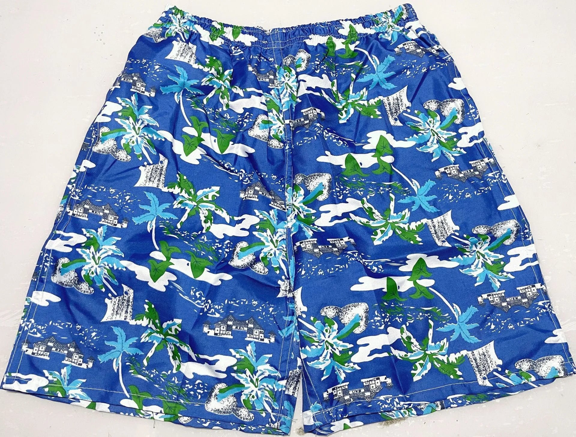 Men's floral print five-point swimming trunks in polyester fabric, free size
