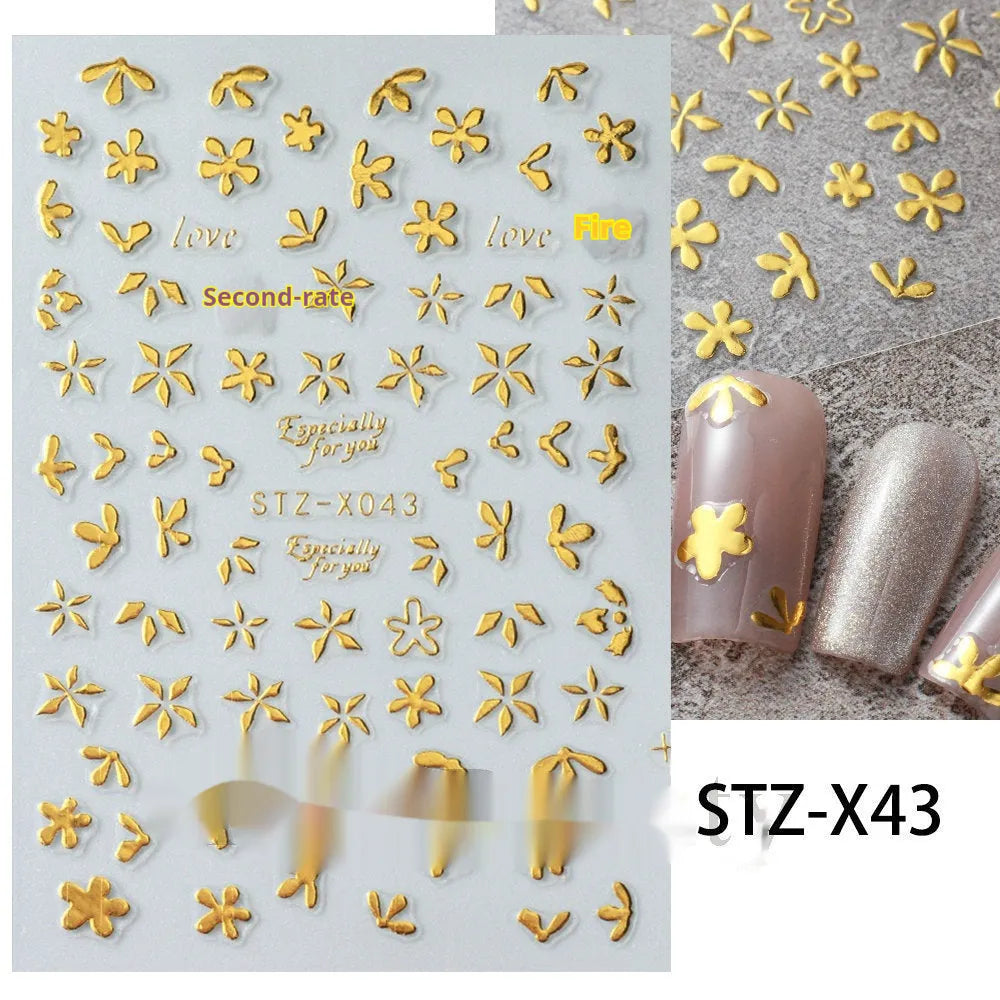 Sheet of black and silver strip nail art stickers with cartoon and love heart designs