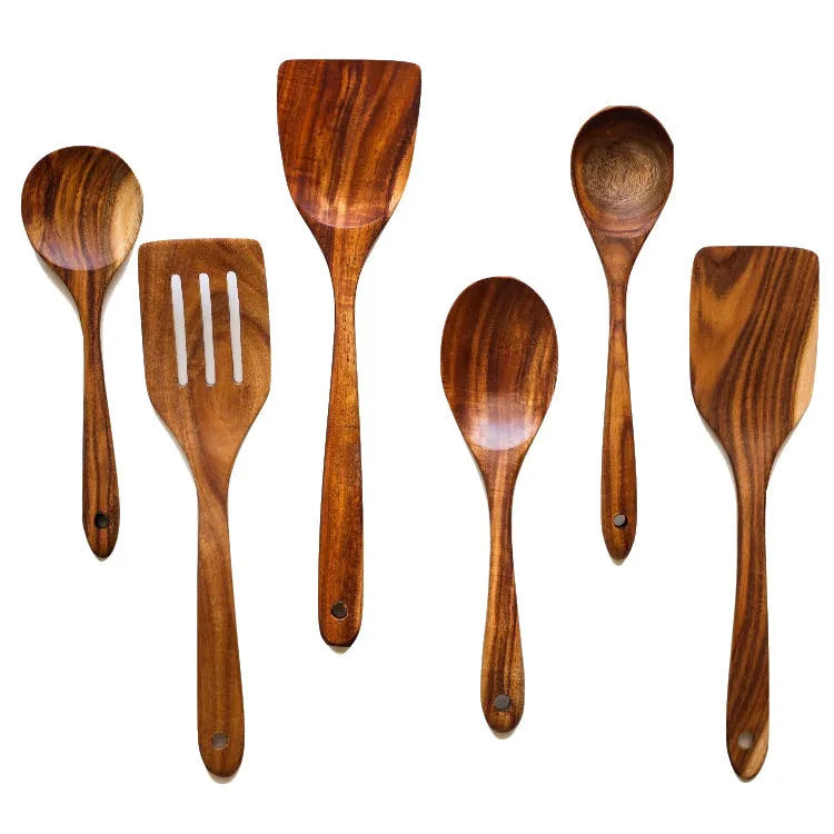 Seven wooden cooking utensils with non-slip handles designed for non-stick pans