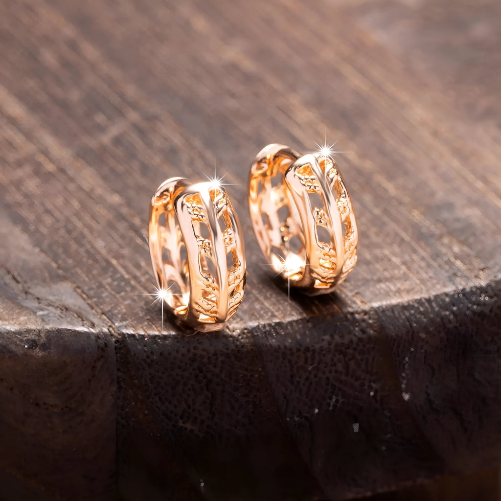 Hollowed copper earrings in heart or leaf shape with rose gold finish