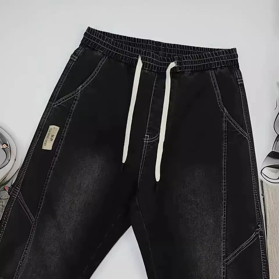 Men's slim fit high-waist ankle-tied harem jeans in denim cotton, available in black, blue, gray