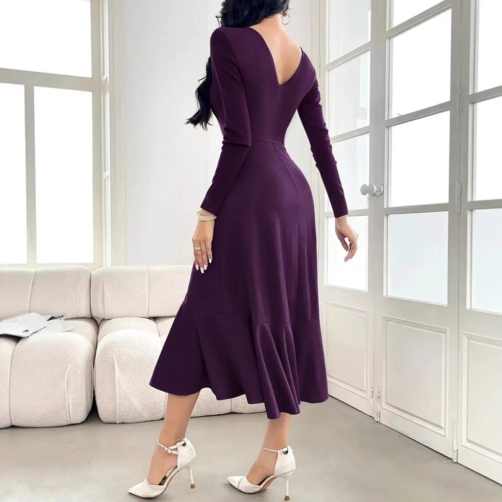 Purple women's long sleeve dress with ruffles and a round neckline