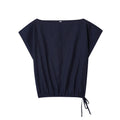 Women's linen blend long sleeve shirt with flounce detail and matching wide leg trousers set on a hanger.
