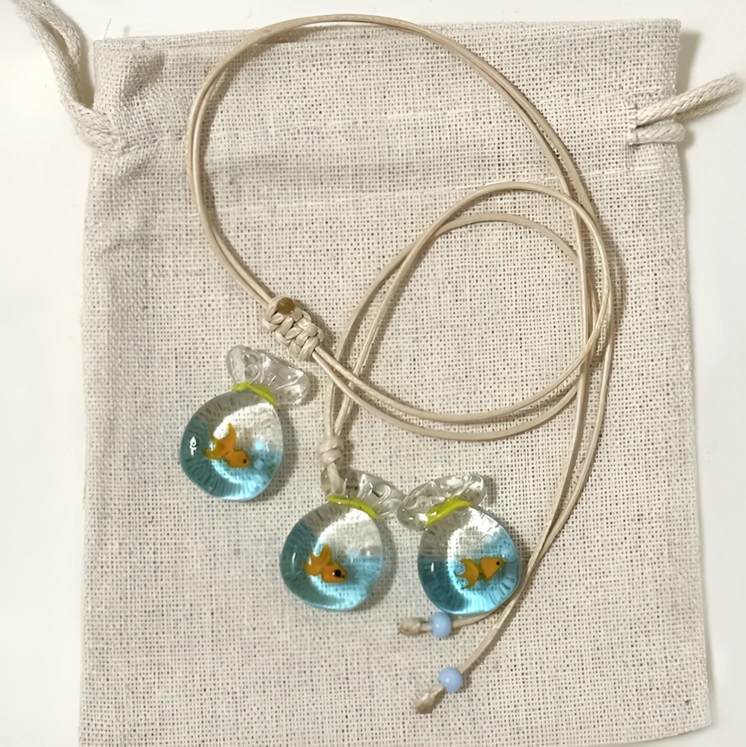Women's coloured glaze skirt pendant necklace with joker design on cotton linen clavicle chain