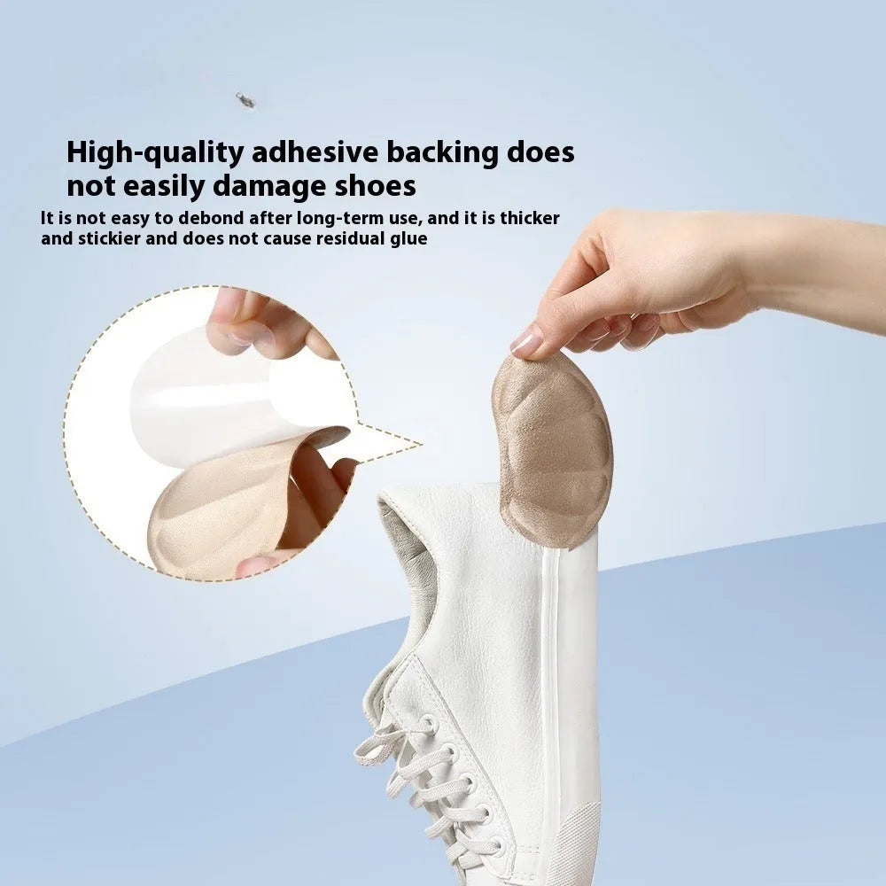 Three pairs of camel-coloured suede anti-slip heel cushion pads for sneakers.