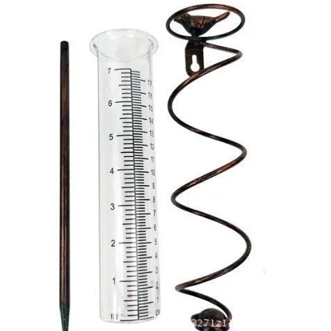 Cast iron hummingbird garden rain gauge with glass measurement tube showing 1-20cm scale