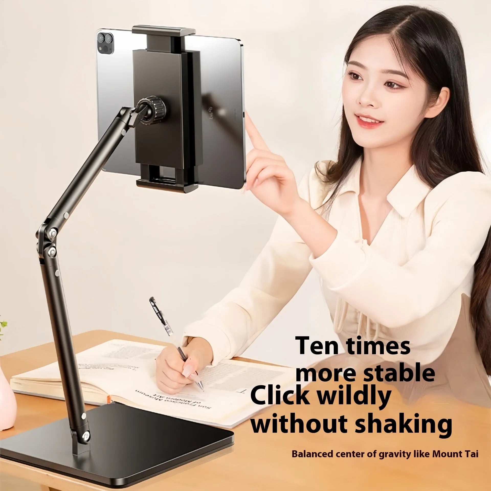 Alloy desktop bracket holding a mobile phone with adjustable arms for live streaming and shooting