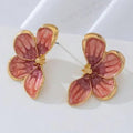 Three-dimensional flower earrings in blue colour with metal finish, exquisite design for women