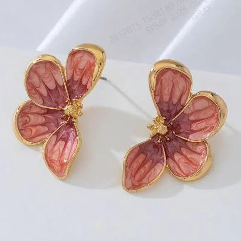 Three-dimensional flower earrings in blue colour with metal finish, exquisite design for women