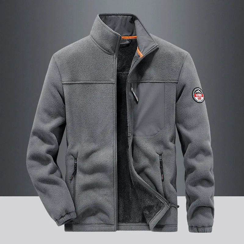 Men's grey fleece cardigan jacket with zippered pockets, shown on a model.