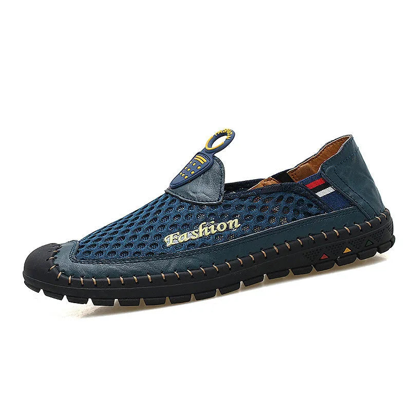 Men's brown mesh casual shoes with round toe and rubber sole on a plain background.