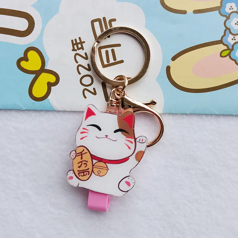 Cartoon lucky cat design plastic certificate sleeve and matching ferrule pendant set.