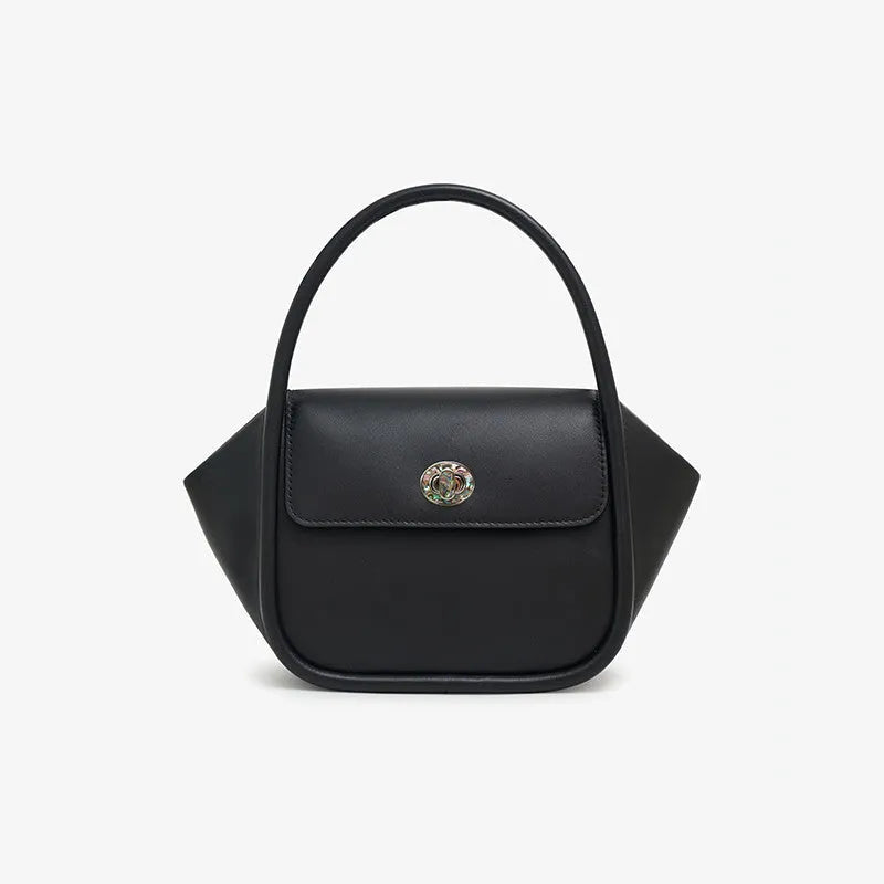 Women's leather wing-shaped tote bag with buckle closure in blue, grey, black, or brown colour options