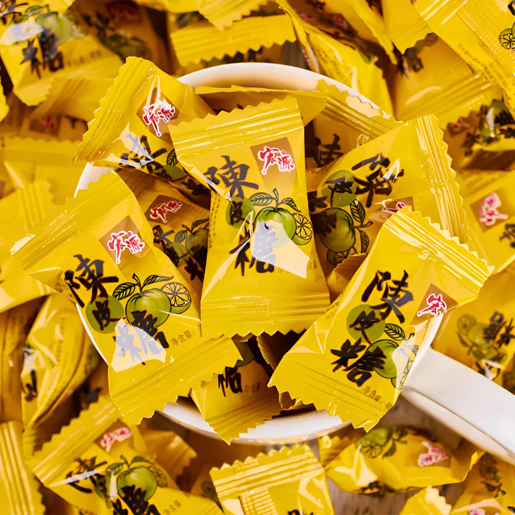 Bag of assorted hard candies: guava, plum, and tangerine peel flavours.