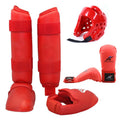 Karate protective gear set showing red leg guards, helmet and boxing gloves for martial arts training