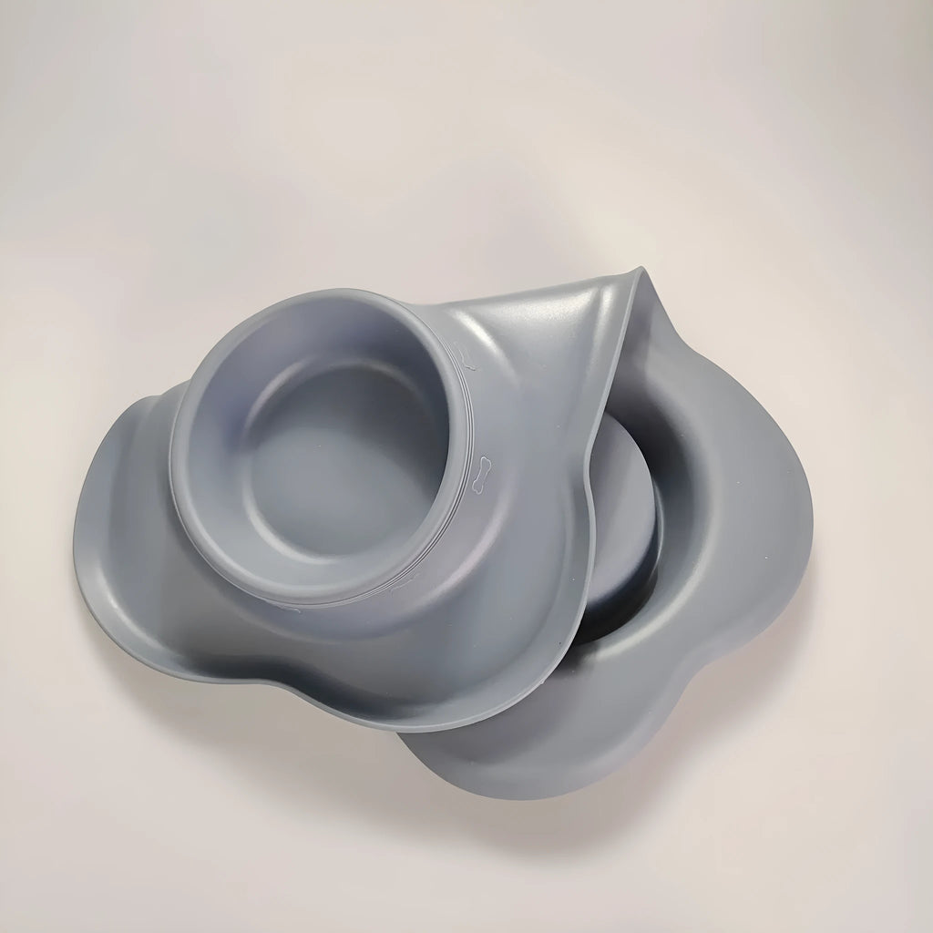 Large silicone dog bowl with stainless steel insert in double bowl configuration for pet feeding