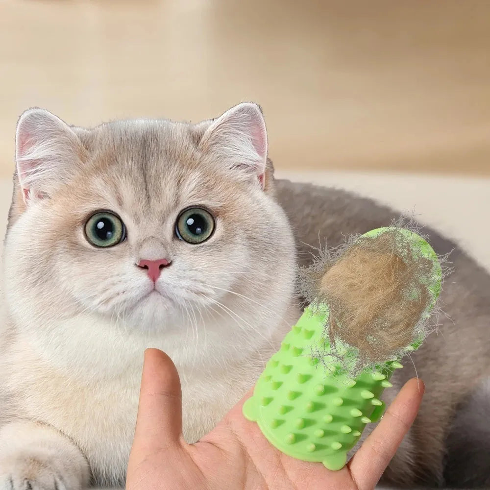 Silicone pet massage comb with adjustable strap attached to table leg