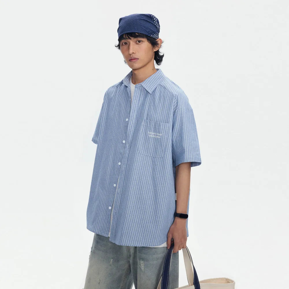 Blue striped short-sleeved overall shirt with cardigan opening and cotton blend fabric