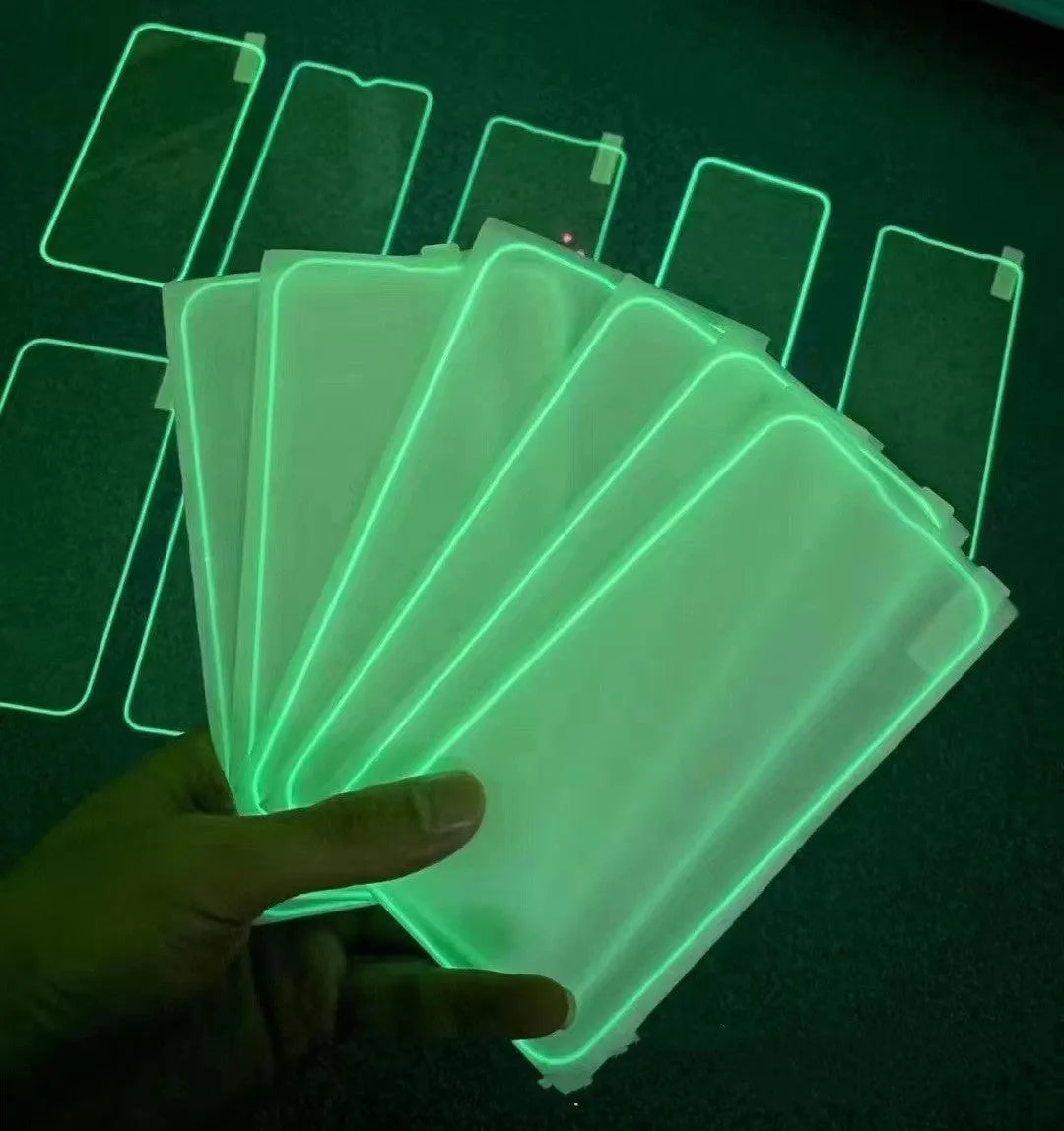 Luminous pink tempered glass screen protector fitted on an iPhone 13 Pro.