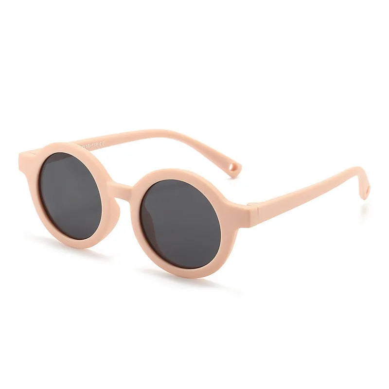 Children's round sunglasses for 0-3 year olds with UV400 protection, shown in a selection of colours.