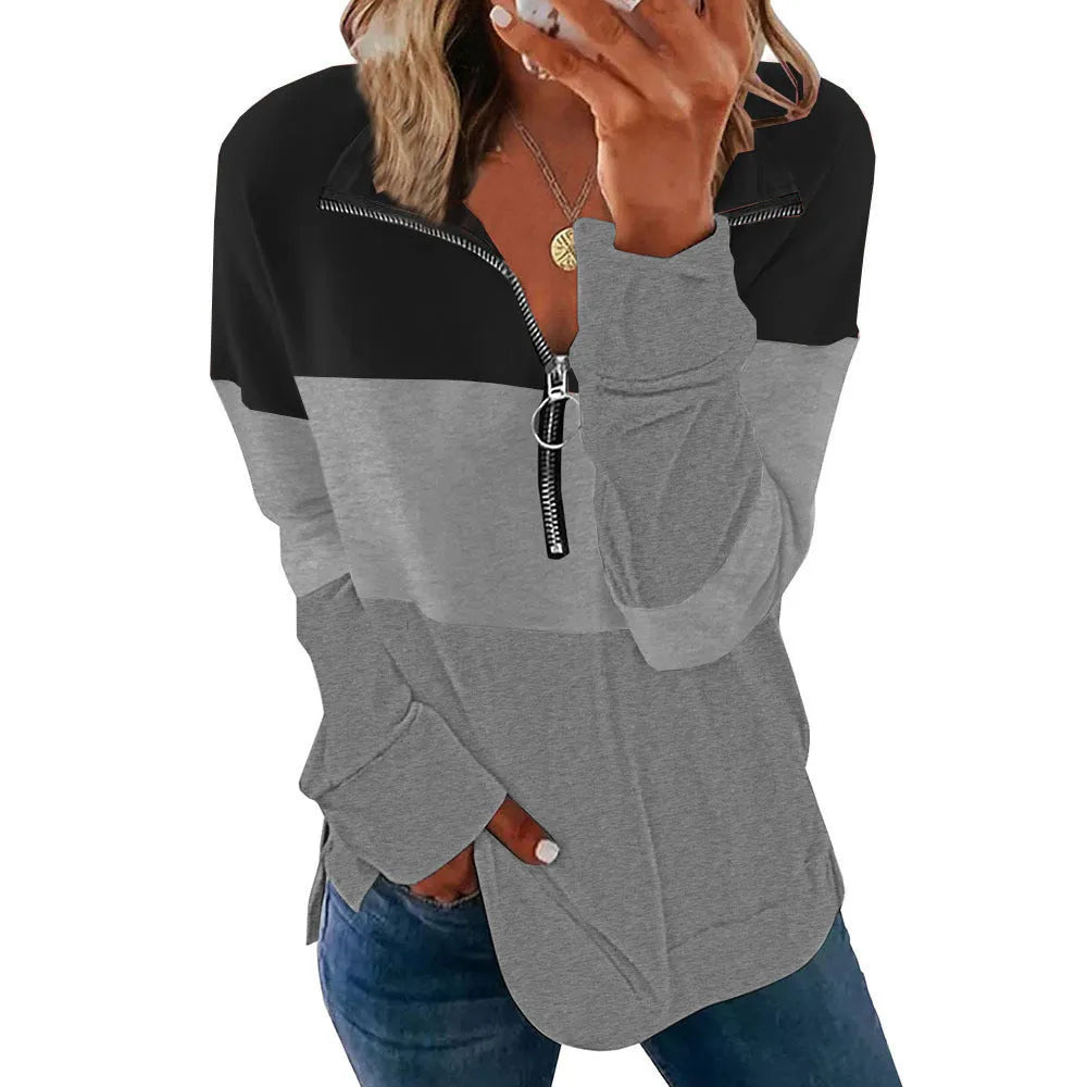 Women's loose long-sleeved leopard print sweater in various colours on a hanger.