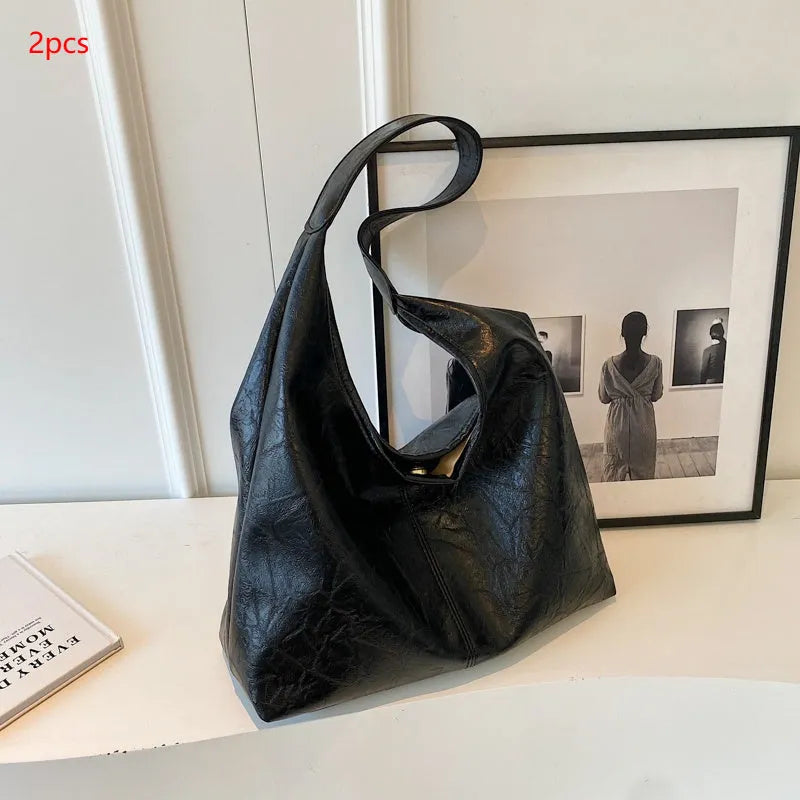 Casual soft leather shoulder bag with large capacity and sandwich pocket in street trend style