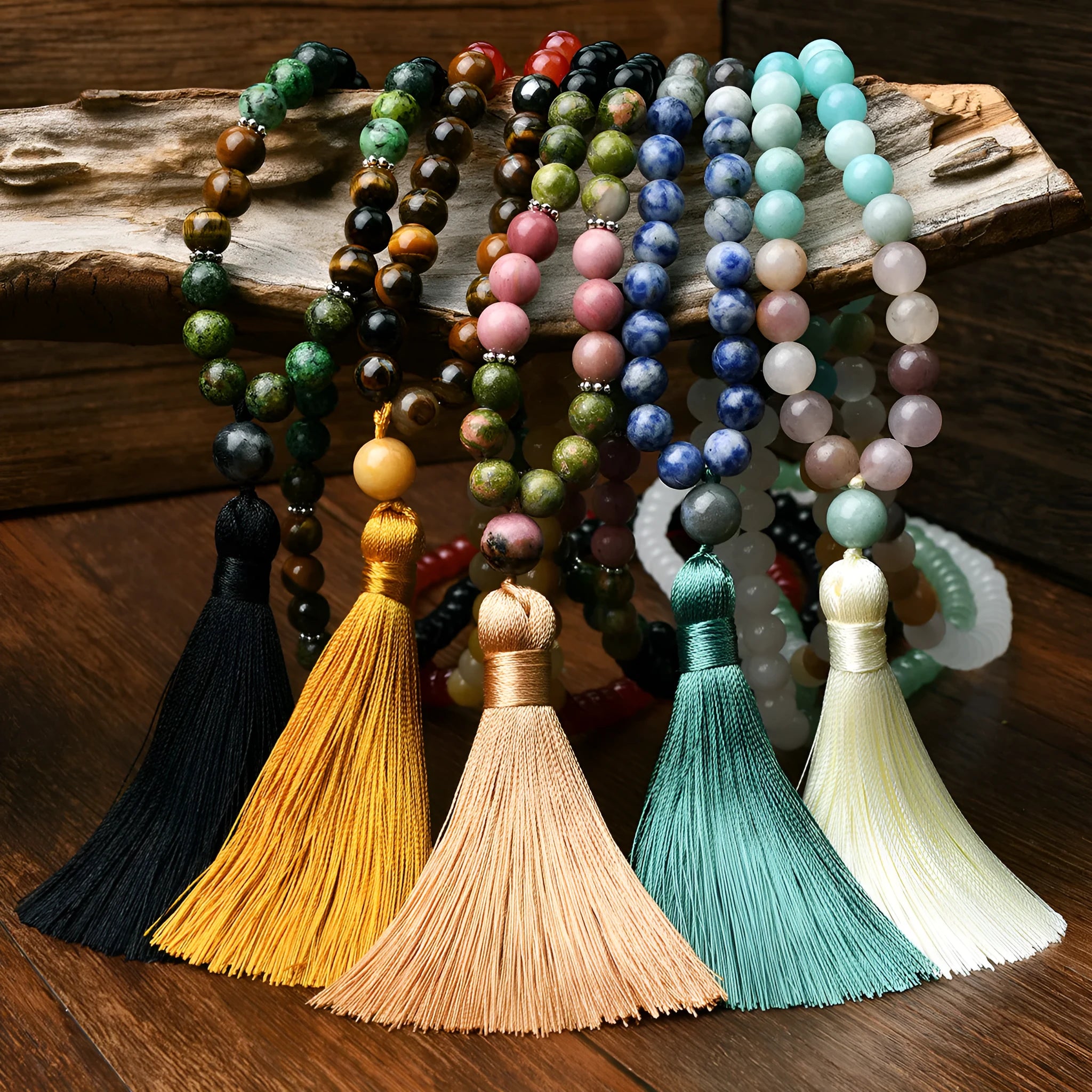 Long bohemian necklace with 108 natural stone beads, a geometric pendant, and a coloured tassel on a ball bead chain.