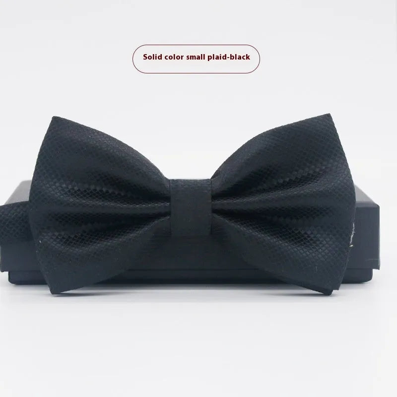 Solid colour polyester bow tie with flat head design measuring 12cm by 6cm