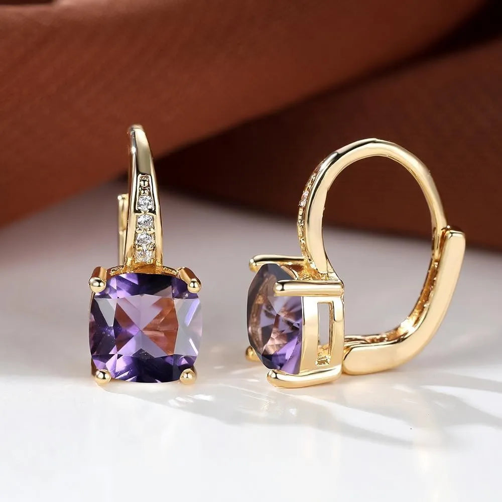 Square geometric ear hook studs with a round zircon stone, shown in a gold electroplated finish.