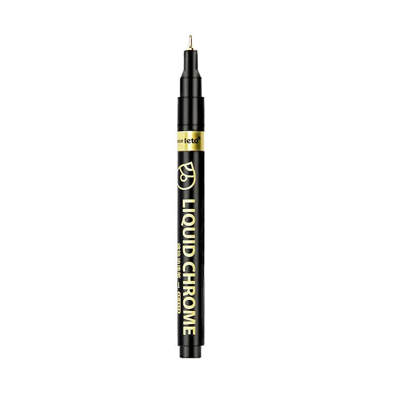 Metal mirror chrome plated marker pen with reflective metallic tip on a smooth surface