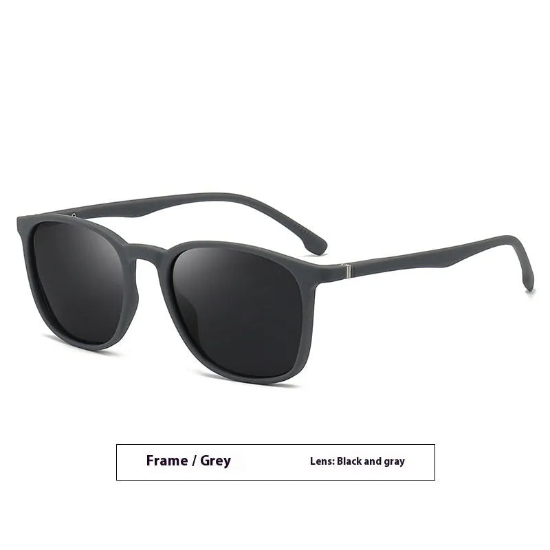 Men's polarised sunglasses with a black frame and dark green lens, showing PC construction and elastic paint finish.