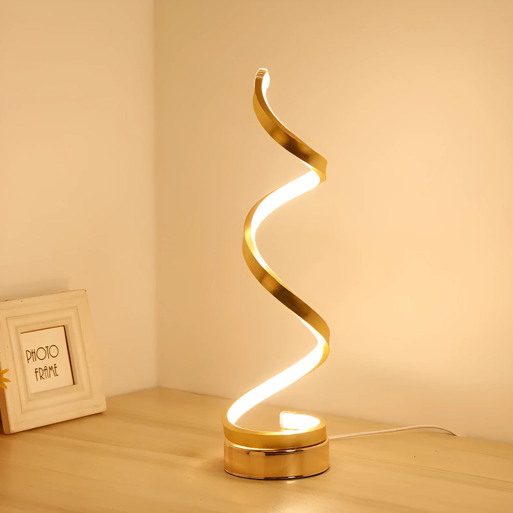 Minimalist black LED table lamp with aluminium shade and tri-colour dimming on wooden bedside table