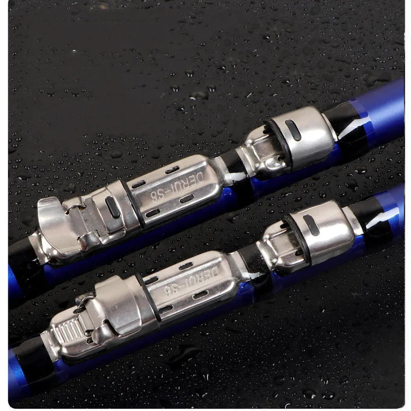 Blue telescopic carbon rock fishing rod extended on a rocky shore for sea fishing