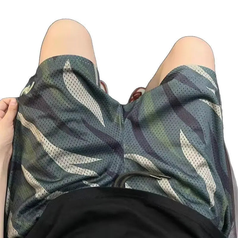 Men's camouflage print straight-leg cotton blend mesh shorts laid flat