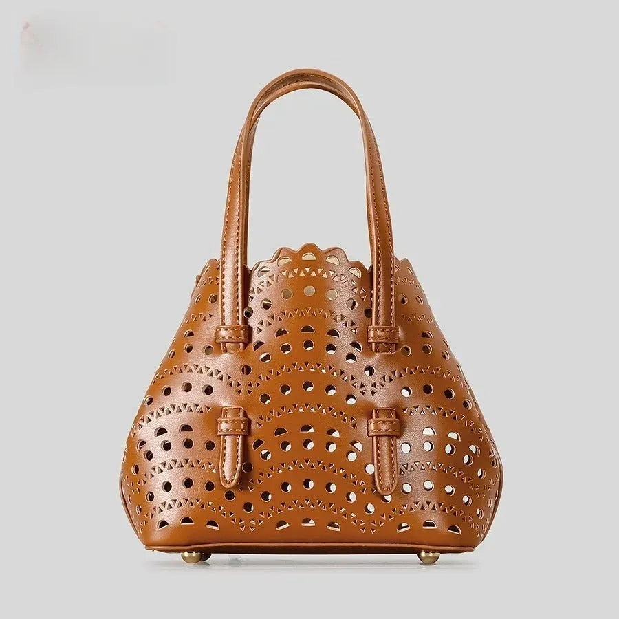 Hollow carved PU messenger bag with three shoulder straps in horizontal square shape