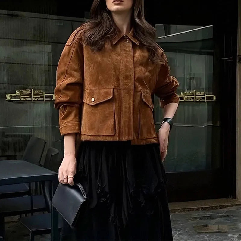Brown polyester suede coat with regular sleeves on a hanger