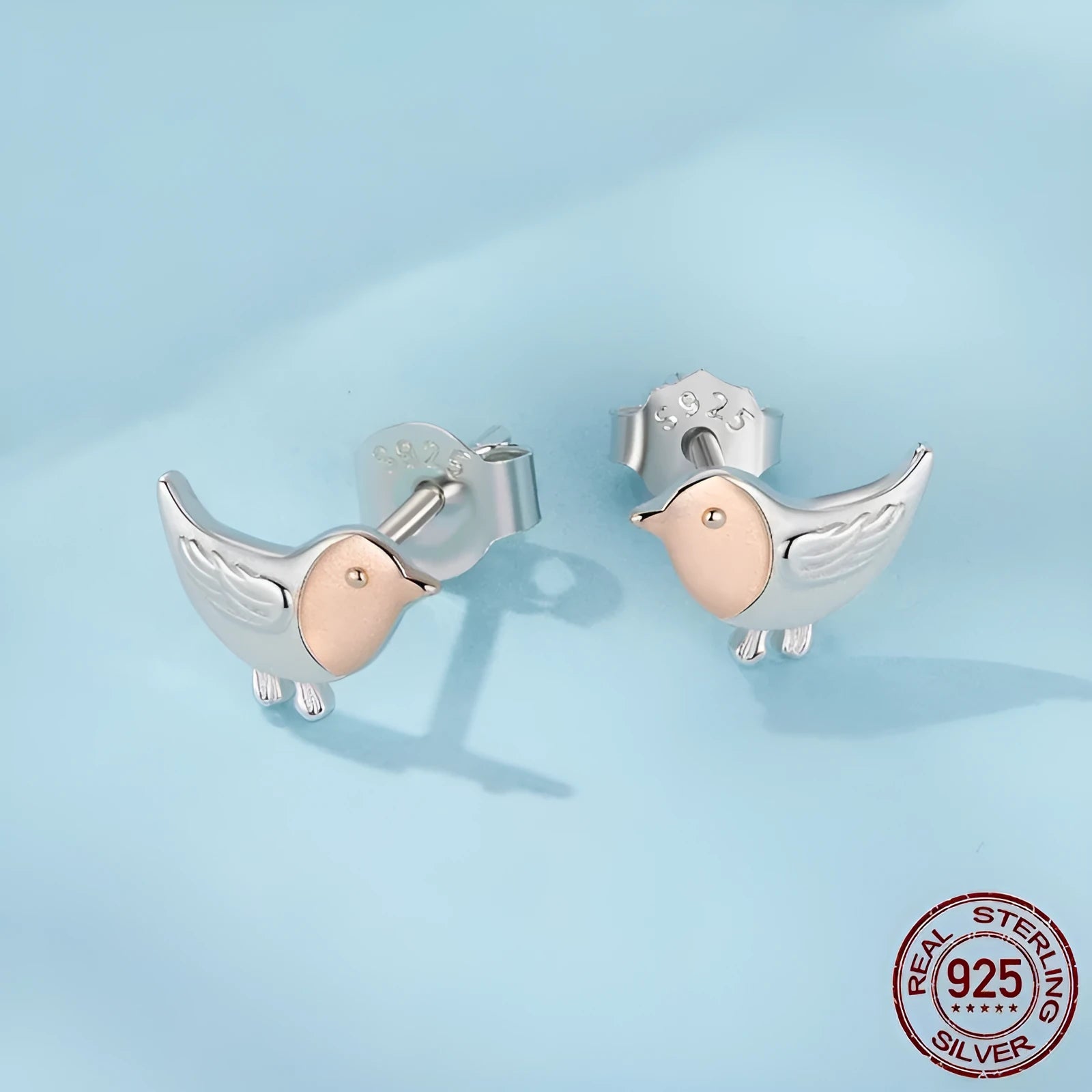 S925 sterling silver bird ear studs electroplated finish three-dimensional design side view