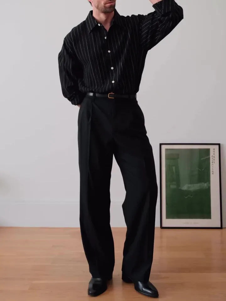Black pinstripe button-down long-sleeve shirt laid flat, showing regular fit and striped pattern.