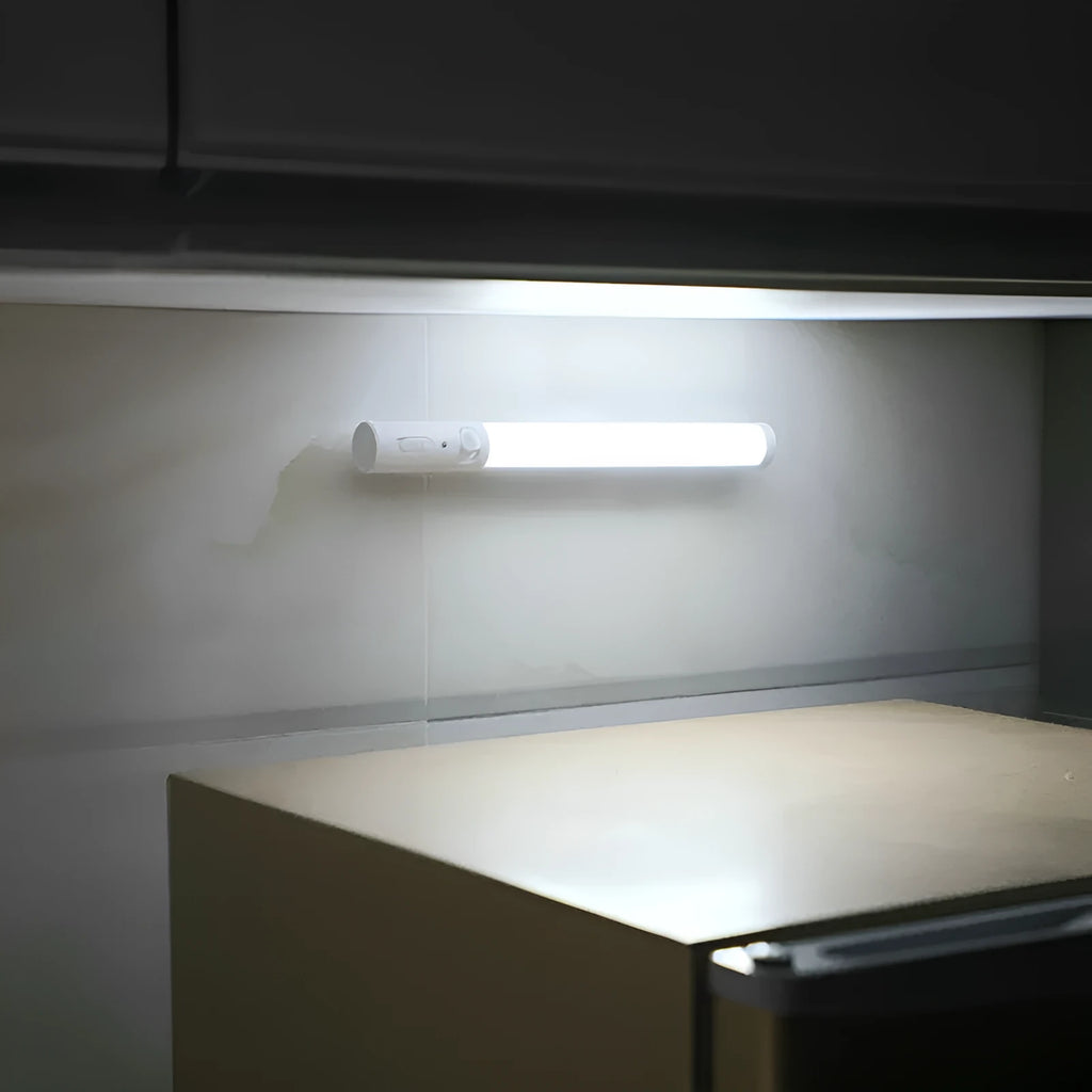 Infrared sensor battery LED wall light with magnetic mount showing cylindrical white housing
