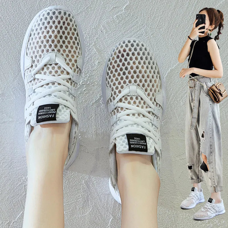 Men's low-top casual sneakers with hollow white mesh upper and round toe on a flat EVA sole.