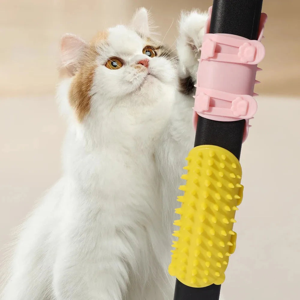 Silicone pet massage comb with adjustable strap attached to table leg