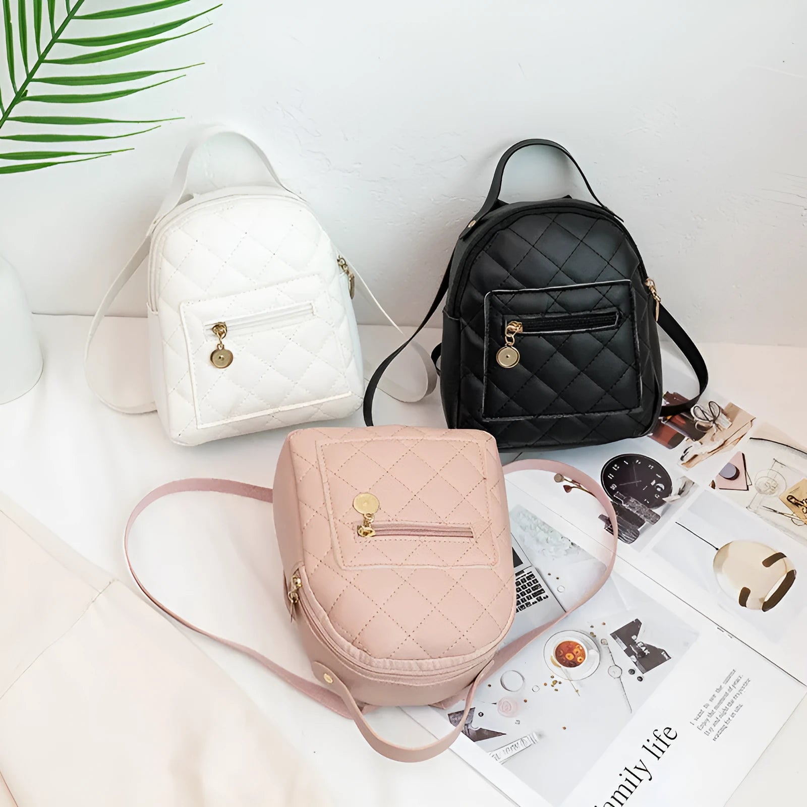 Korean-style embroidered PU school backpack in black with sandwich pockets and soft carry handles