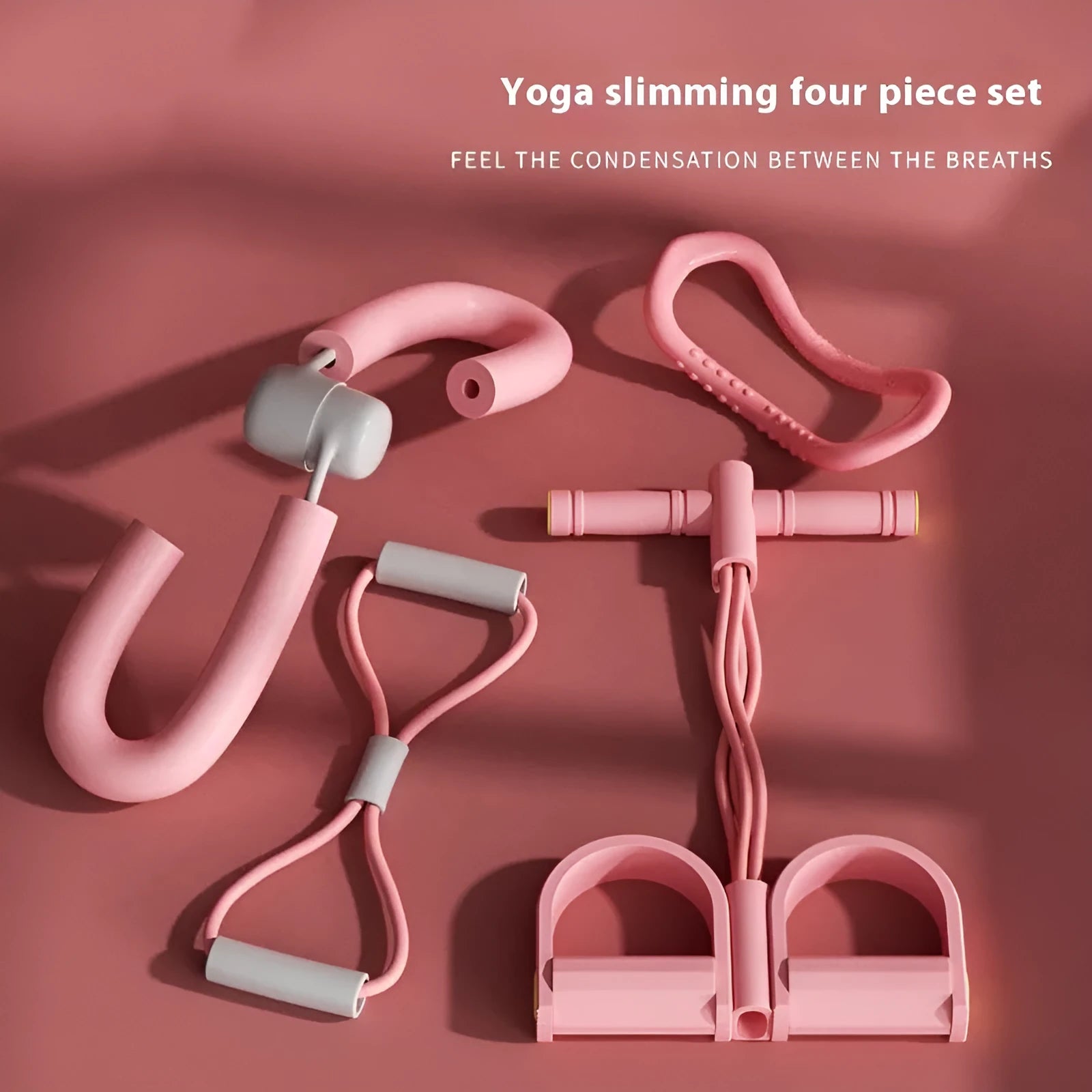 Yoga four piece fitness set showing leg beauty device, yoga ring, pedal tension device and figure eight tension rope